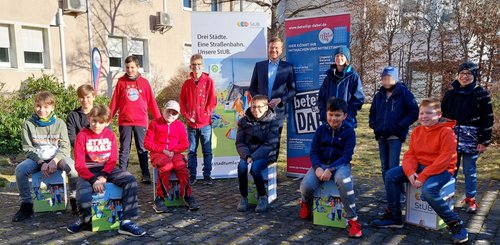 Gruppenfoto des Verbandsvorsitzenden des ZV StUB Marcus König mit den Teilnehmenden der Lego-Planungswerkstatt.